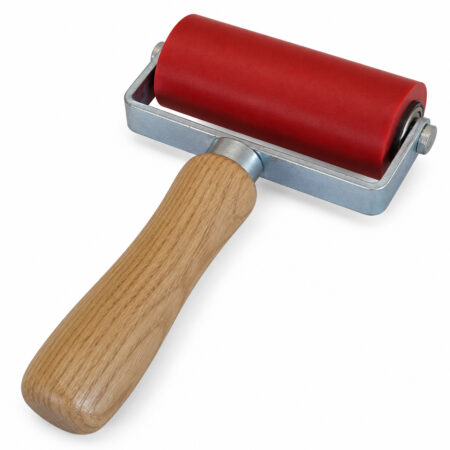 Angled detail view of the R004 80 mm Red Silicone Flooring Pressure Roller.
