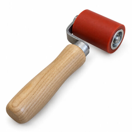 Angled detail view of the R007 45 mm Red Silicone Flooring Pressure Roller.