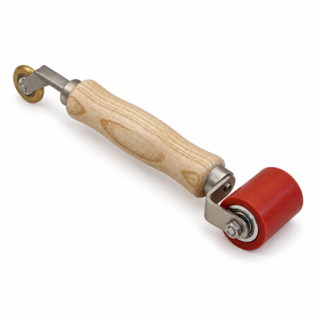 Angled detail view of the R013 45 mm Red Dual-Head Flooring Pressure Roller.